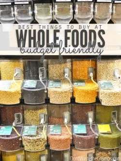 Bins of dry bulk goods at Whole Foods with text overlay, "Best Things to Buy at Whole Foods, Frugal Foodie Edition".