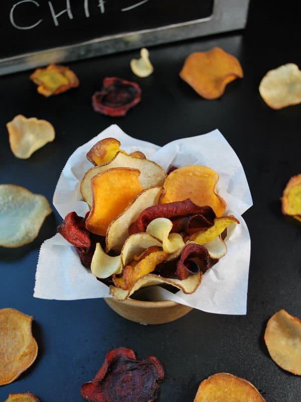 Delicious and crispy homemade root vegetable chips that are just like Terra, only much healthier and cost up to 50% cheaper! Save some cash and make them yourself! :: DontWastetheCrumbs.com