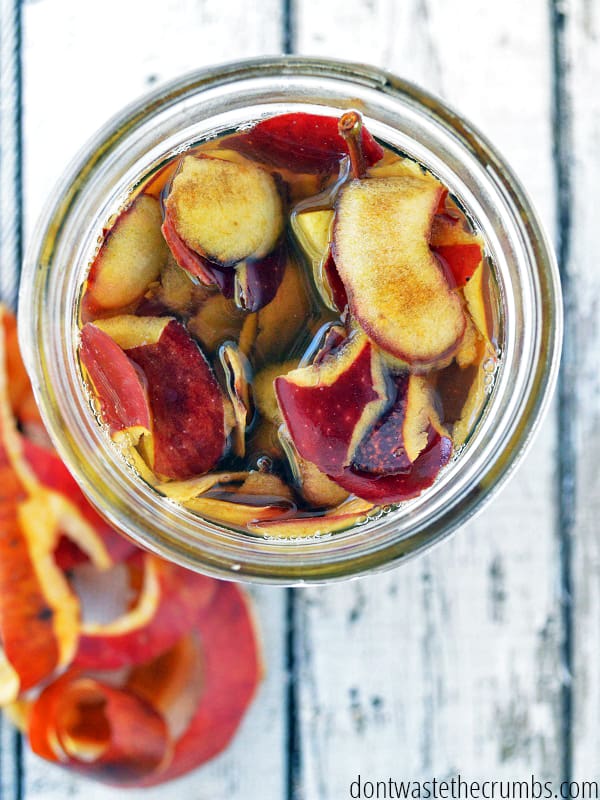 Apple peels and water in a mason jar