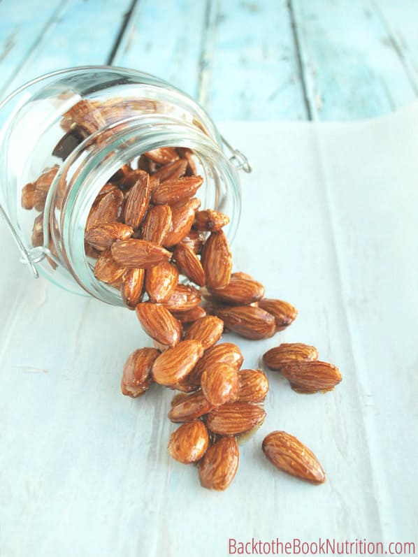 Homemade honey roasted almonds are THE BEST topping for any salad, hands down. Plus you save over 70% by making them yourself! 3 simple ingredients and ready in less than hour, stop wasting your money on expensive store-bought nuts and go the healthier, more affordable route by doing them yourself! :: DontWastetheCrumbs.com