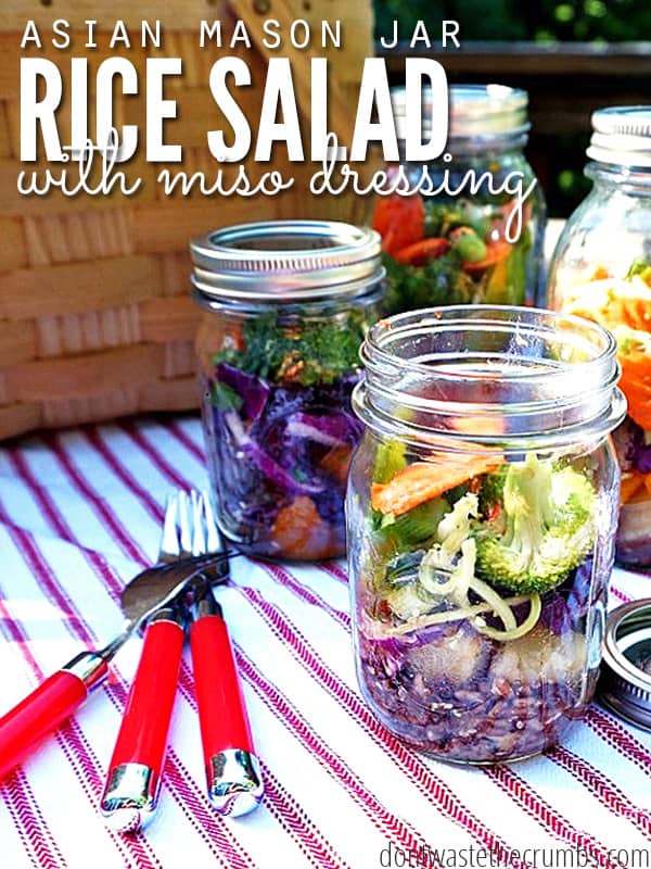 Summertime is here and that means picnics! Change up the usual sandwiches with this easy recipe for a Asian Rice Mason Jar Salad - fresh vegetables, rice and a miso vinaigrette layered in a picnic-friendly jar makes for a great lunch on the go! :: DontwastetheCrumbs.com