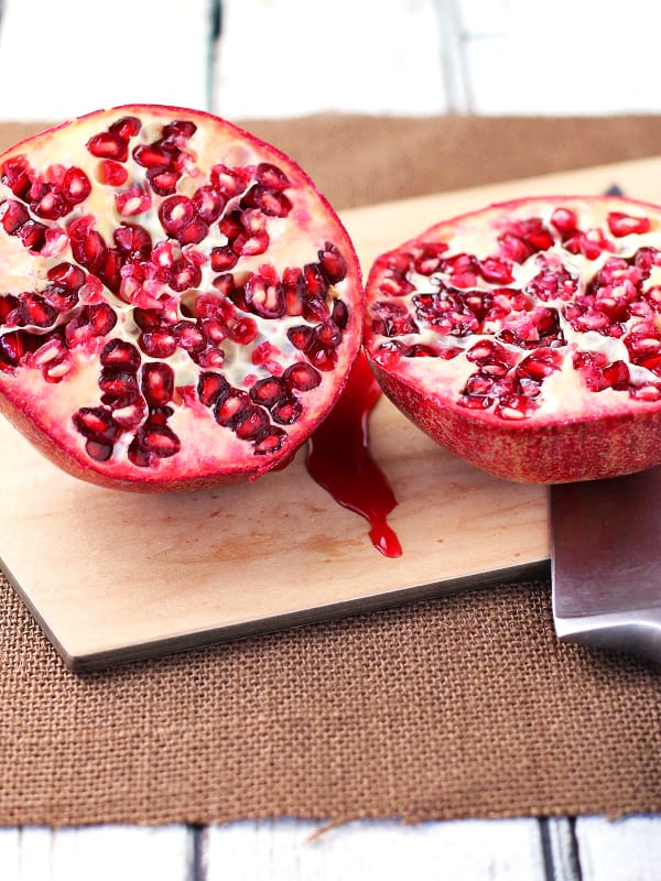 We love pomegranates but hate the work involved. Fortunately we learned how to seed a pomegranate with this super simple trick! From start to finish, the entire process takes less than 2 minutes. Saves tons of money compared to buying the seeds already done for you! :: DontWastetheCrumbs.com