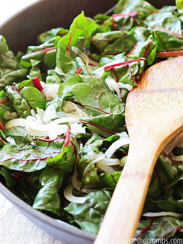 My whole family loves this savory pasta with onions, bacon and greens. It's an easy recipe that's ready in just 30 minutes, and it's super affordable.