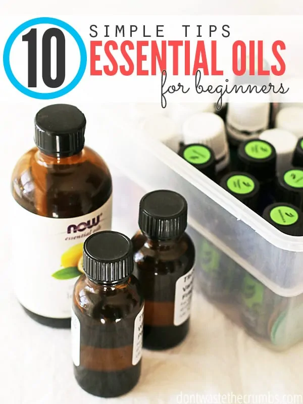 Multiple bottles of essential oils sitting in a tub and on a table with text overlay, "10 Simple Tips: Essential Oils for Beginners".