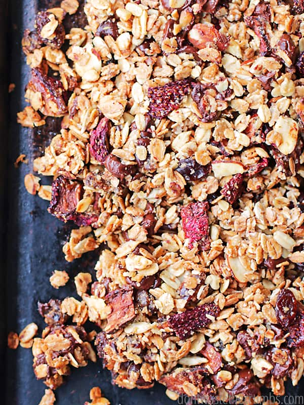 Oh my goodness, these strawberry chocolate granola clusters are SO GOOD! They're crunchy like store-bought, but the combination of strawberries and chocolate? Oh my... Get the two secret ingredientst to granola clusters in this easy recipe for strawberry chocolate granola - you'll save money and never buy granola clusters again! :: DontWastetheCrumbs.com