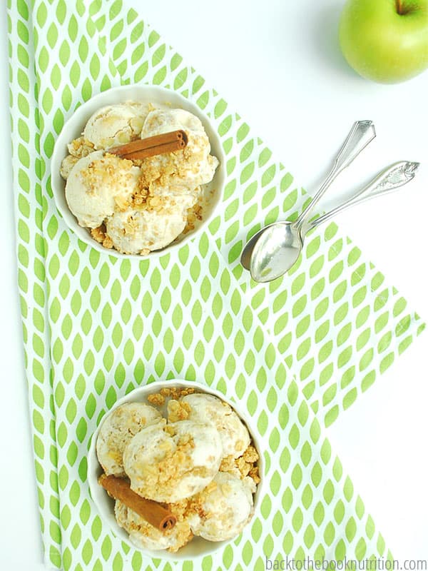 When apples are in season, we can't wait to make homemade ice cream - apple crumble ice cream that is! Homemade crumble topping with fresh apples and sweet ice cream, it's literally our favorite flavor and so much healthier than store bought! :: DontWastetheCrumbs.com