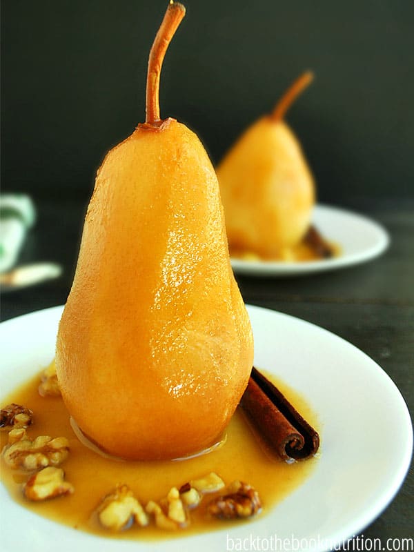 Crock Pot Poached Pears with cinnamon & walnuts are a perfect healthy dessert for busy fall weeknights. It's an easy recipe with just 4 ingredients, hands-off cooking in the slow cooker and it cooks while you're eating dinner. Slow cooker poached pears are a super easy way to get the kids to eat more fruit AND enjoy a healthy dessert at the same time! :: DontWastetheCrumbs.com