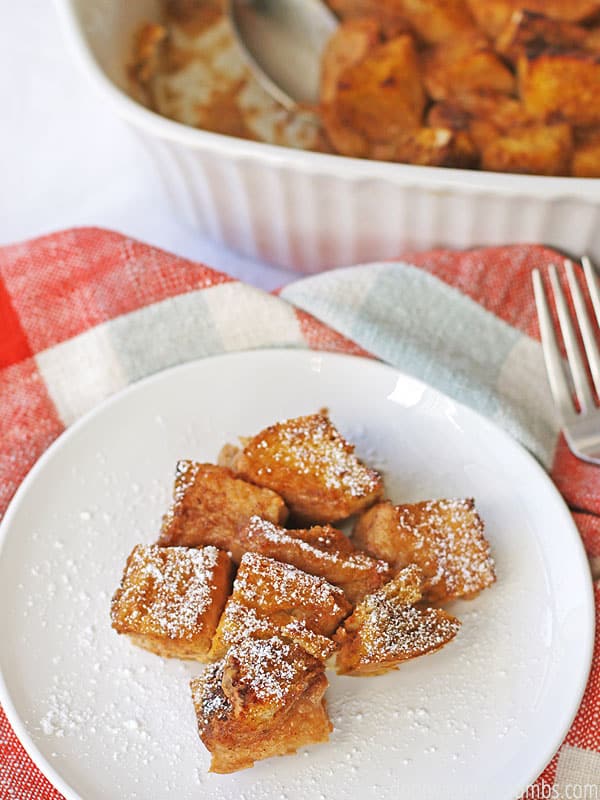 Sprinkle this overnight pumpkin french toast casserole with powdered sugar as a final touch.