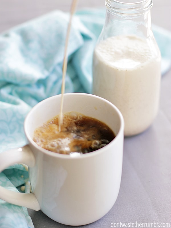 This easy recipe for Homemade Vanilla Bean Coffee Creamer is so good! It requires just 4 simple ingredients and in minutes you'll have homemade vanilla coffee creamer without the junk in store-bought. Plus it's frugal too! :: DontWastetheCrumbs.com