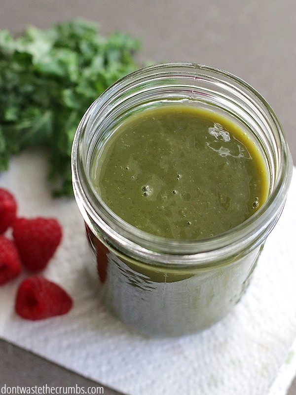 Glass jar of a green smoothie. This can be made without a blender!