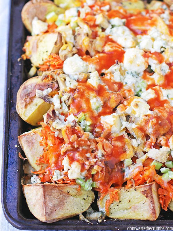 When you open the fridge to find "nothing," you can still make this easy recipe! One-pan Buffalo Chicken Potatoes is like chicken wings meets french fries. Crispy potatoes topped with shredded chicken and melted cheese (plus the requisite carrots and celery), topped with two cheeses and hot sauce - your family will love it and ask for more! :: DontWastetheCrumbs.com