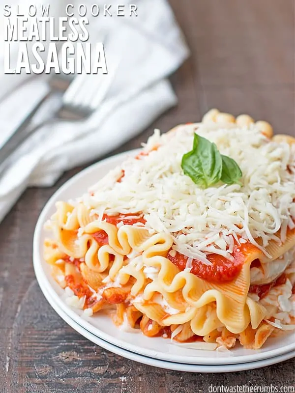 My kids love this slow cooker meatless lasagna, and my husband doesn't even miss the meat! This recipe still boasts tons of protein and since it cooks in the slow cooker, I don't have to even be in the kitchen to cook dinner! This slow cooker dinner is on our meal plan almost every week! :: DontWastetheCrumbs.com