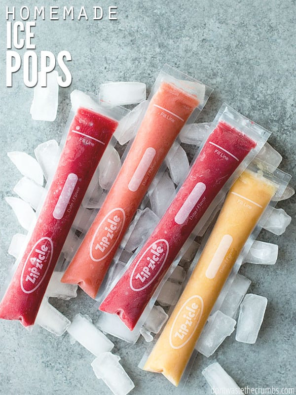 Red, orange, and yellow homemade ice pops in Zipzicle plastic tubes lay on a bed of ice. A text overlay reads "Homemade Ice Pops."