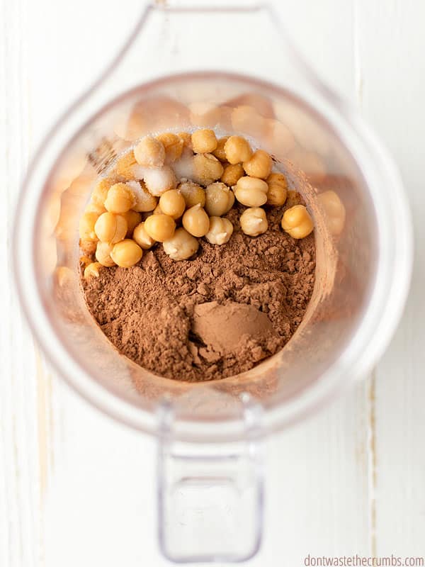Blender with chickpeas, cocoa powder and salt for chocolate hummus.