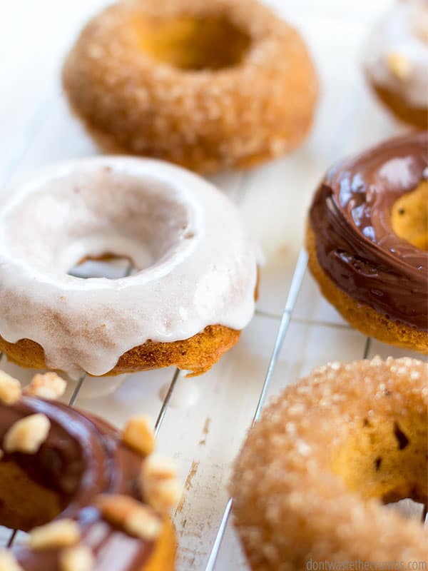 Quick and easy pumpkin donuts made with all real food ingredients! Sweetened with honey and maple syrup, no processed sugar. Your family will love them!
