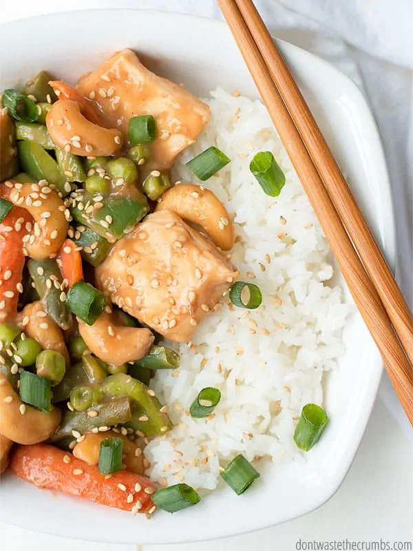 30 Minute Cashew Chicken is my new go-to for busy nights. With the kids in activities three nights a week, we need some easy meals to fill bellies and keep the budget down!