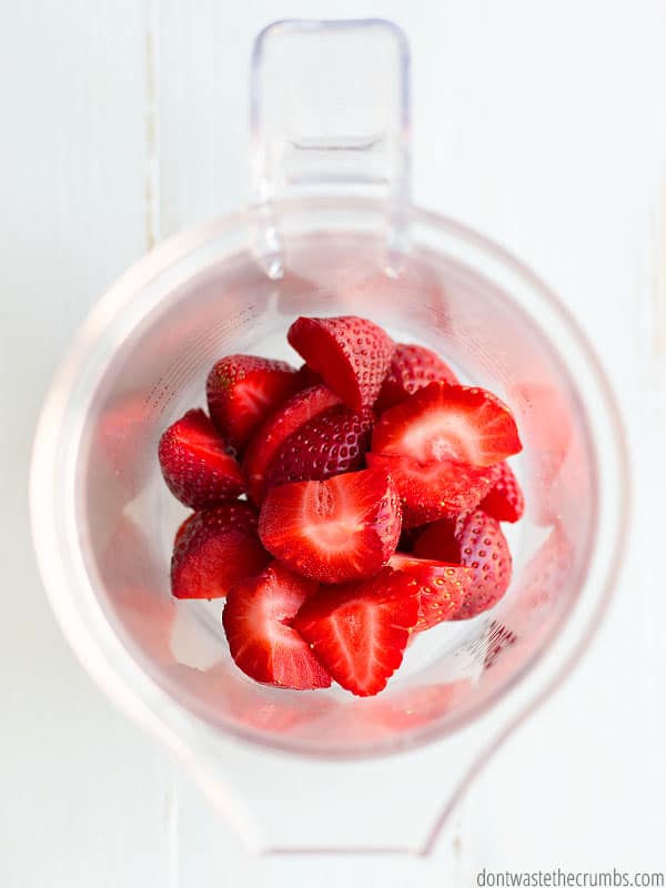 Sliced strawberries in a Blendtec blender.