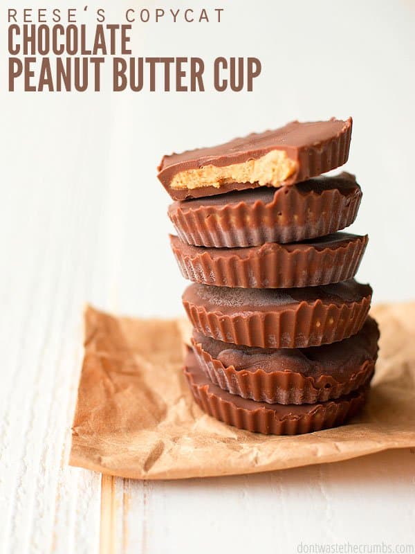 The cover photo of my Homemade Peanut Butter Cups Recipe. 6 PB cups are stacked on top of each other while sitting on a table top and napkin. The top one has a single bite out of it. 