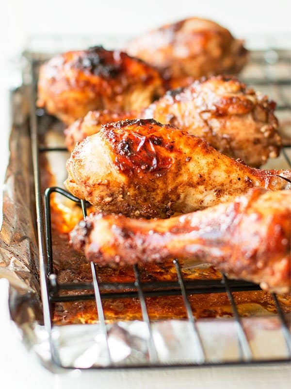 Chinese 5 spice chicken wings are on a baking rack and ready to be served.