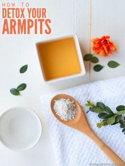 White bathroom counter with a round white bowl filled with water, a wooden spoon filled with Bentonite clay, and a square bowl with Apple Cider Vinegar. Text overlay How to Detox Your Armpits.