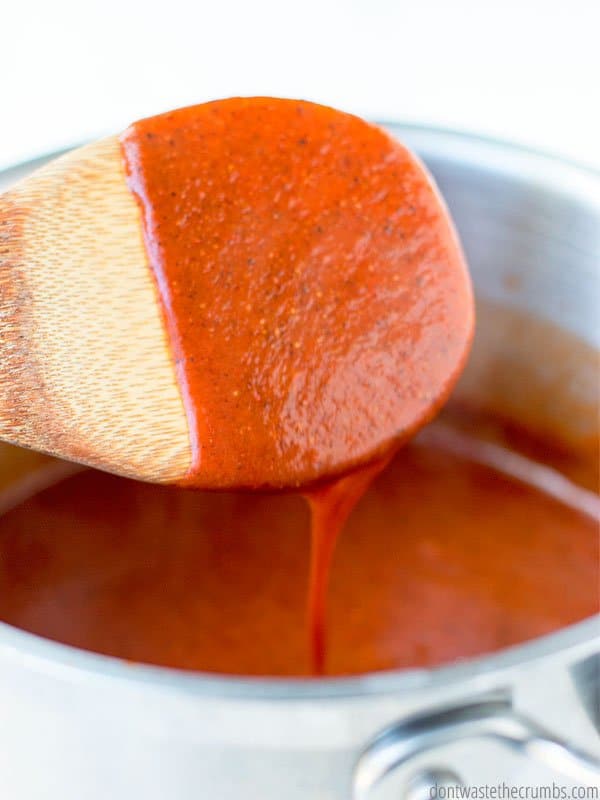 Have you ever tried to make enchilada sauce? This red enchilada sauce recipe is super easy and quick. Ready to go with real food ingredients you have on hand. Plus it makes plenty for two batches of enchiladas all for only $.60!