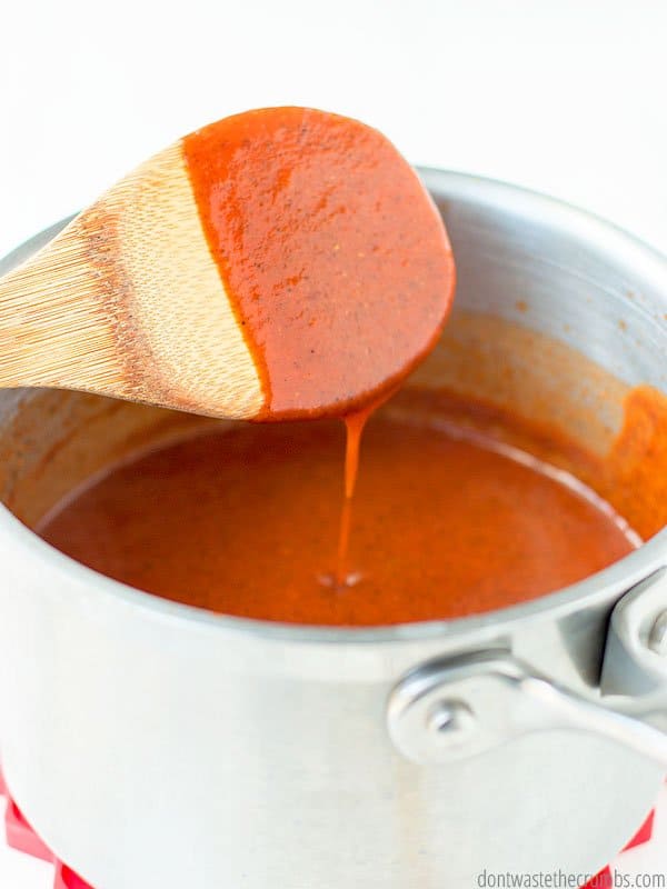 This recipe for homemade enchilada sauce takes home the prize. It tastes amazing, has all real food ingredients (and no junk), and is super cheap. All winning categories in my book!