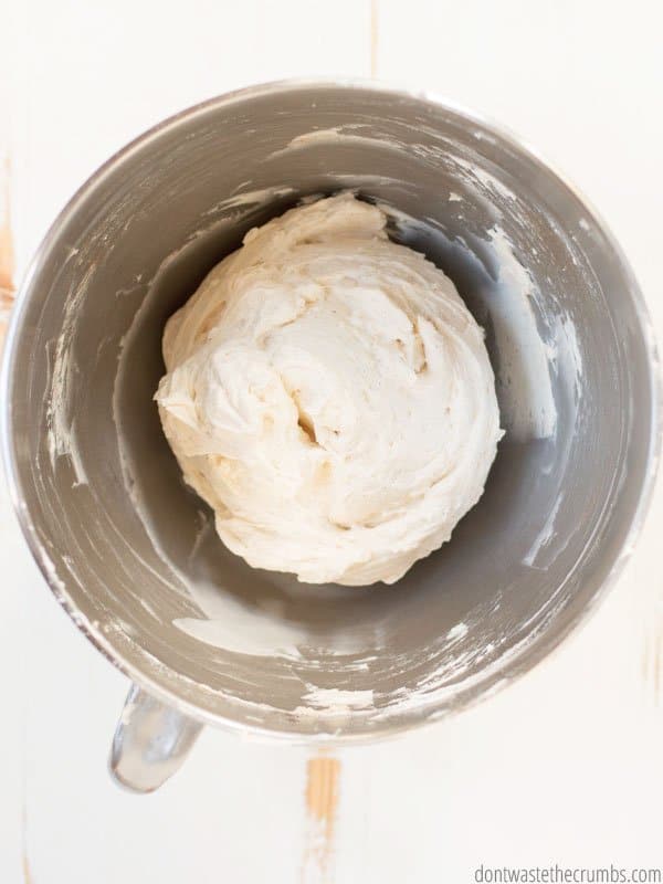 Pizza dough in a KitchenAid mixer.