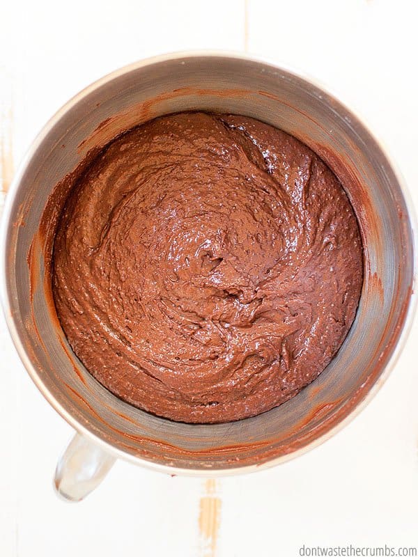 Chocolate cake mix in a KitchenAid mixer.
