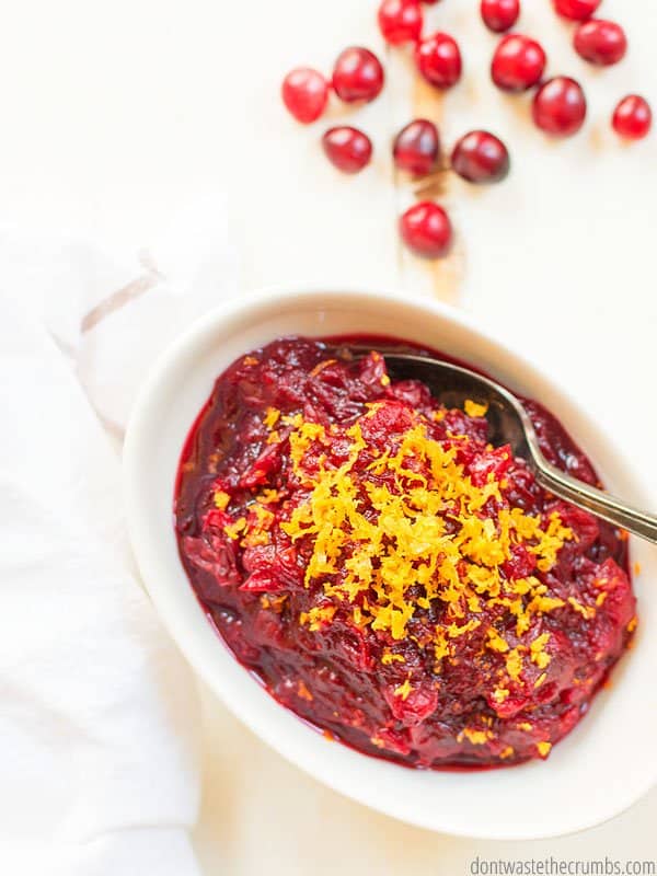 This cranberry sauce recipe is better tasting and much healthier than store bought Ocean Spray or Alton Brown brands. No artificial flavors or bad ingredients. Only fresh cranberries, oranges, and maple syrup!