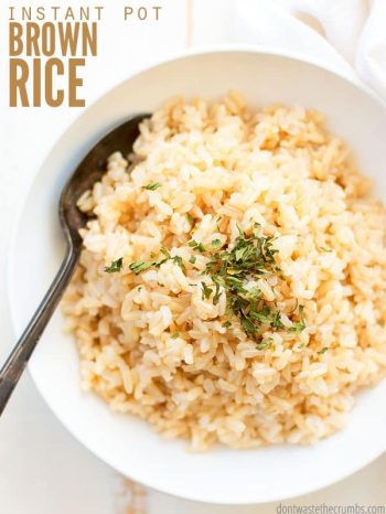 Bowl of brown rice with parsley on top. Text overlay says, "Instant Pot Brown Rice".