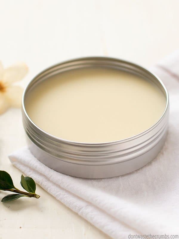 A jar of finished magnesium lotion has solidified and cooled, leaving a smooth finish on top, and is ready for use.