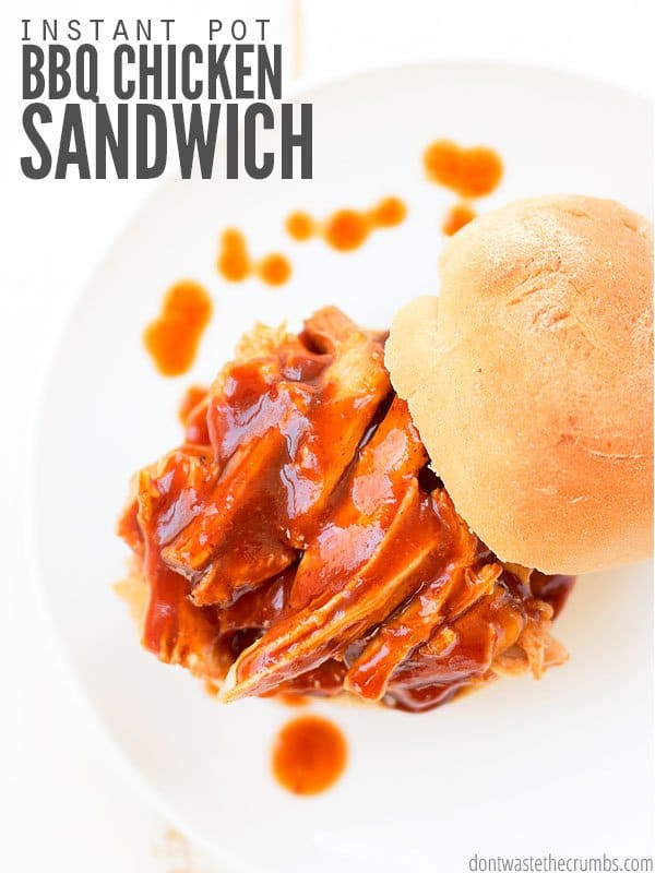 BBQ chicken sandwich on a bun with text overlay, "Instant Pot BBQ Chicken Sandwich".
