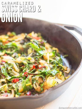 Cast iron skillet filled with steaming Swiss Chard and caramelized onions. Text overlay Caramelized Swiss Chard & Onion.