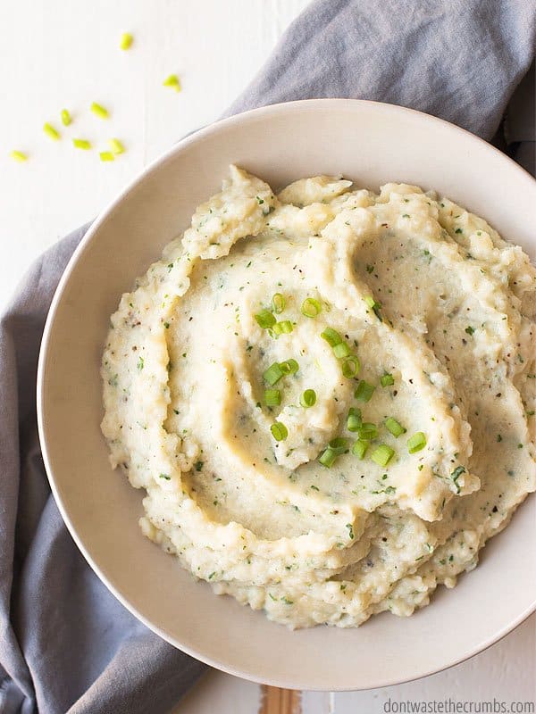 Perfectly mashed cauliflower makes a great side dish! Whole30, keto, paleo, and just plain delicious.