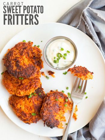 White dinner plate with four round, fried Sweet Potato fritters, one with a bit take out of it. A small dish of dipping sauce sits on the side. Text overlay Carrot Sweet Potato Fritters.