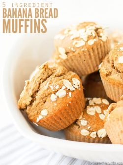 White serving bowl filled with banana bread muffins, topped with rolled oats. Text overlay 5 Ingredient Banana Bread Muffins.