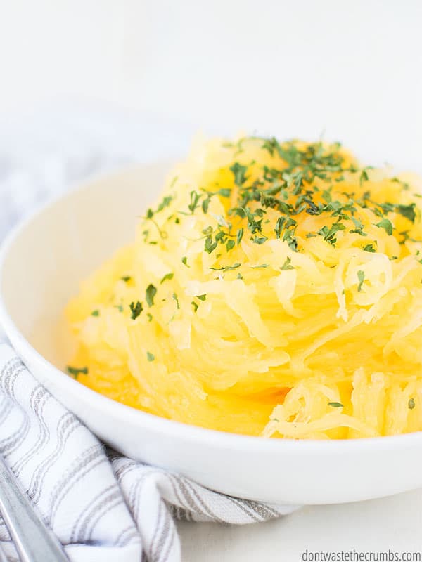 Read this tutorial on how to cook spaghetti squash in the Instant Pot, how to cut it, and a trick to keep it from getting too watery.
