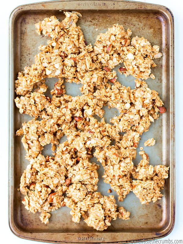 Homemade peanut butter chocolate granola is our new favorite snack! Make a big batch because you're going to need it!