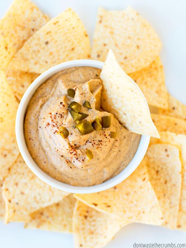 Unlike "fake cheese" this vegan nacho cheese recipe uses cashews. Yet, it's so creamy and delicious you won't know you aren't using velveeta!