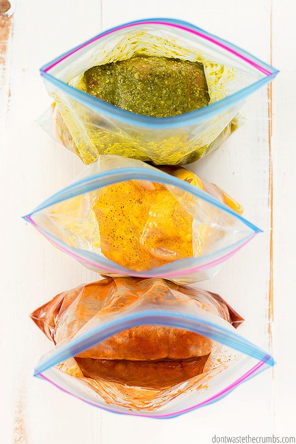 Freezer crockpot dump meals are in ziplock bags. Pictured is a top view with the ziplock bags open.