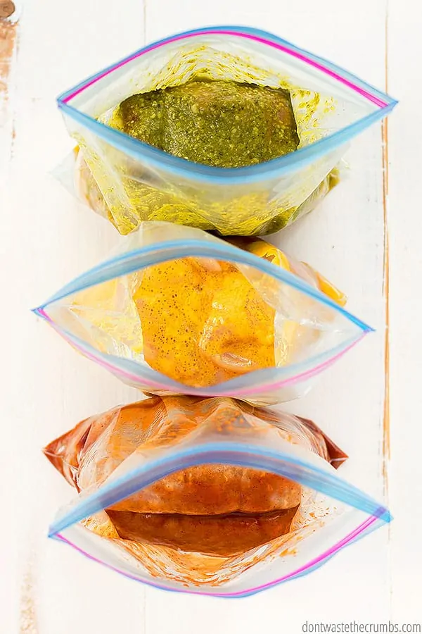 Freezer crockpot dump meals are in ziplock bags. Pictured is a top view with the ziplock bags open.