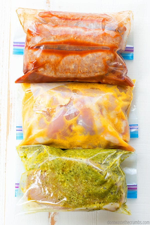 Pictured are ziplock bags with dump meals and stacked on top of each other.