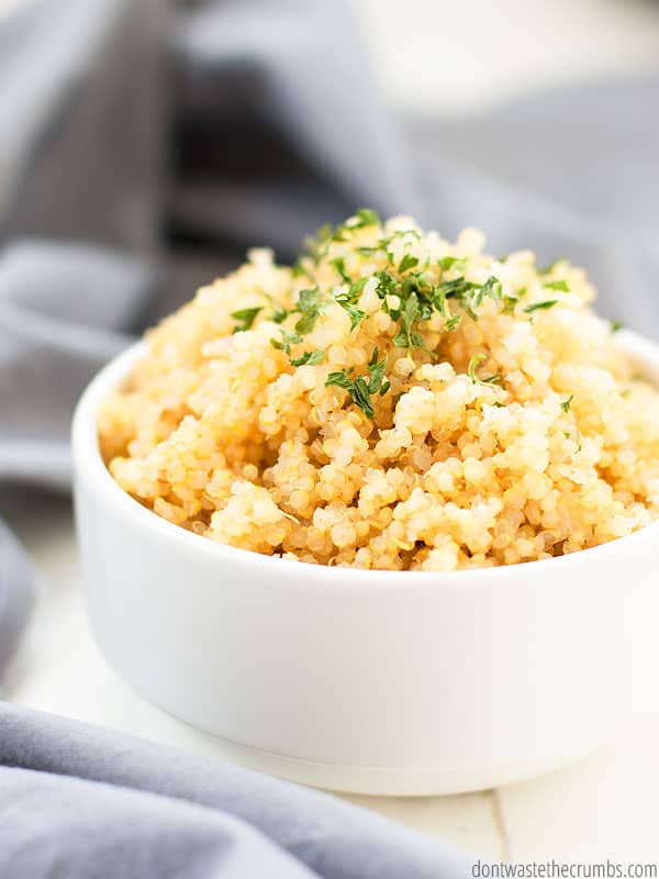 Fluffy quinoa in a white bowl.