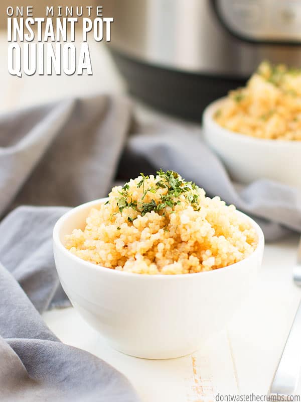 Image showing a white bowl full of homemade quinoa. Text overlay reads "One Minute Instant Pot Quinoa"