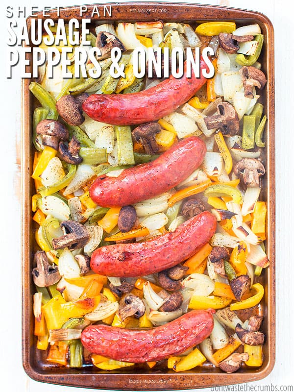 Sheet pan sausage peppers and onions, with mushrooms on a sheet pan, easy weeknight recipe. 