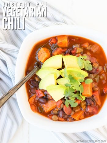 Super easy Instant Pot vegetarian chili has sweet potatoes & is just a bit spicy. Slow cooker option included; serve over quinoa, potatoes or cornbread! : : DontWasteTheCrumbs.com