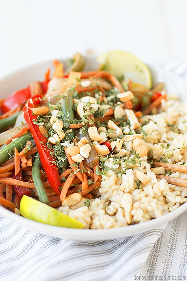 One way to customize your stir fry is by adding chicken or nuts, like cashews or peanuts for protein.