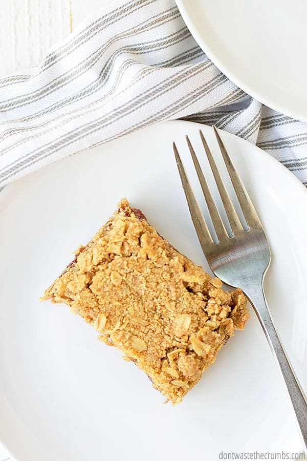 Enjoy this recipe for chewy oatmeal bars, made with homemade or store-bought jam, healthy whole grain flour, and nutrient rich oatmeal.
