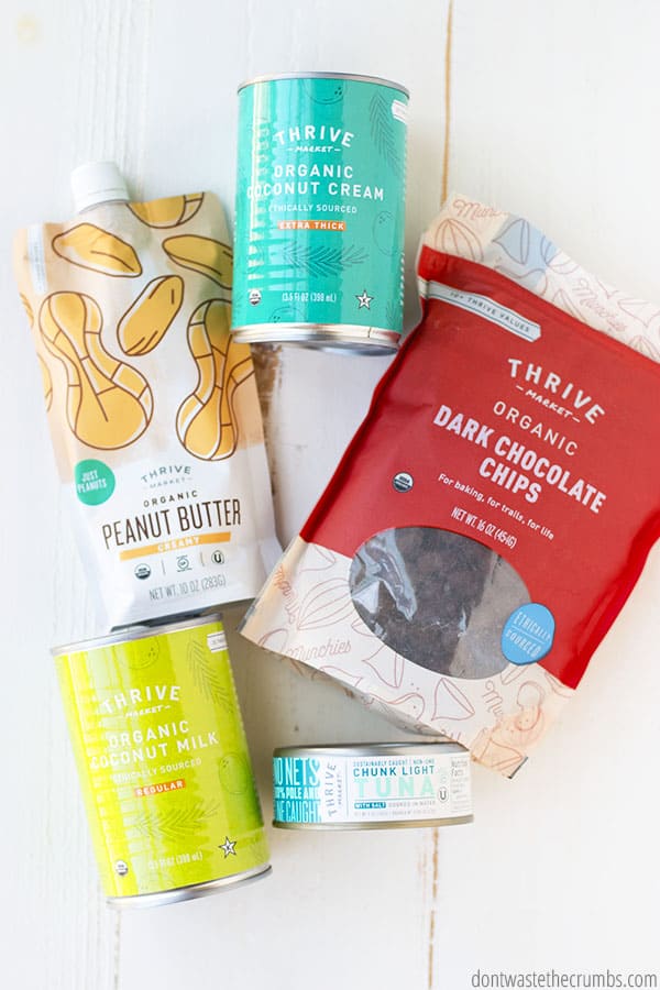 Thrive Market products: Organic coconut cream, organic peanut butter, organic dark chocolate chips, organic coconut milk, and chunk light tuna