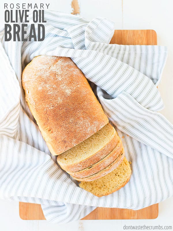 Make this artisan rosemary olive oil bread recipe quickly in a Dutch oven or machine. Inspired by La Brea, it's become our family's favorite yeast bread!